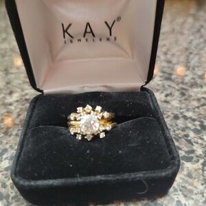 Beautiful 1 1/4 kt diamond solitaire with guard, guard has 18 diamonds.